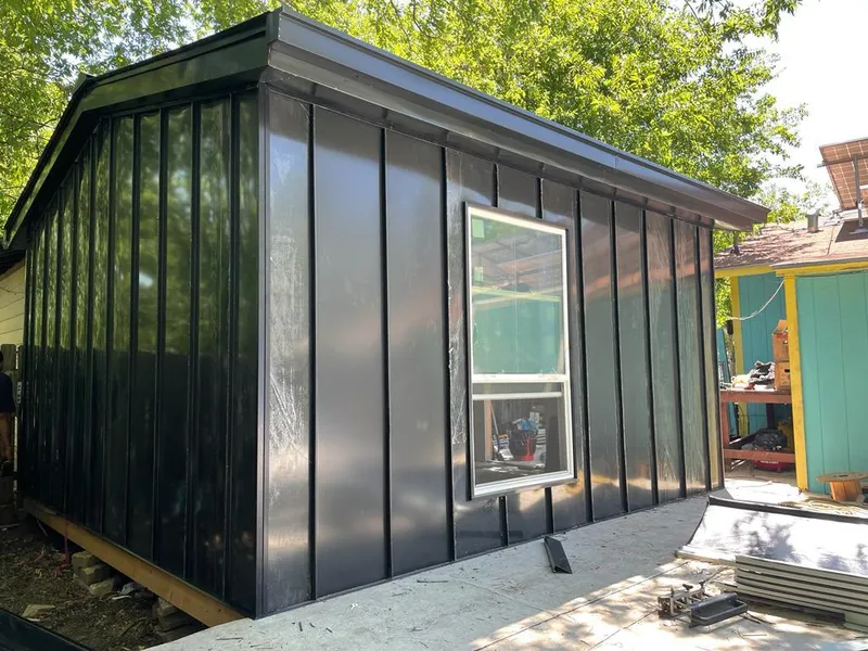 Black standing seam metal wall panels for Roof Inspection in Brigham City