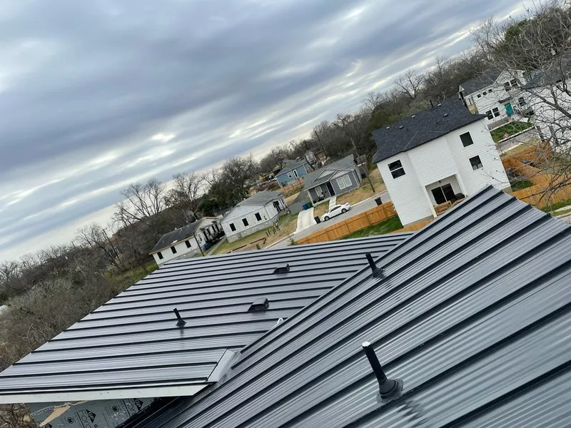 Standing seam metal roof panels with vents for Skylight Repair in Brigham City